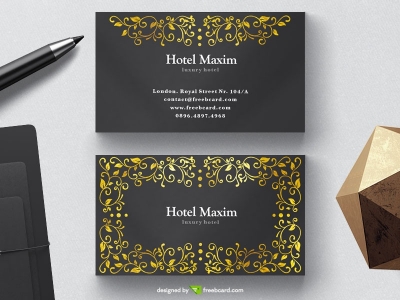 Luxury black business card with golden floral elements 